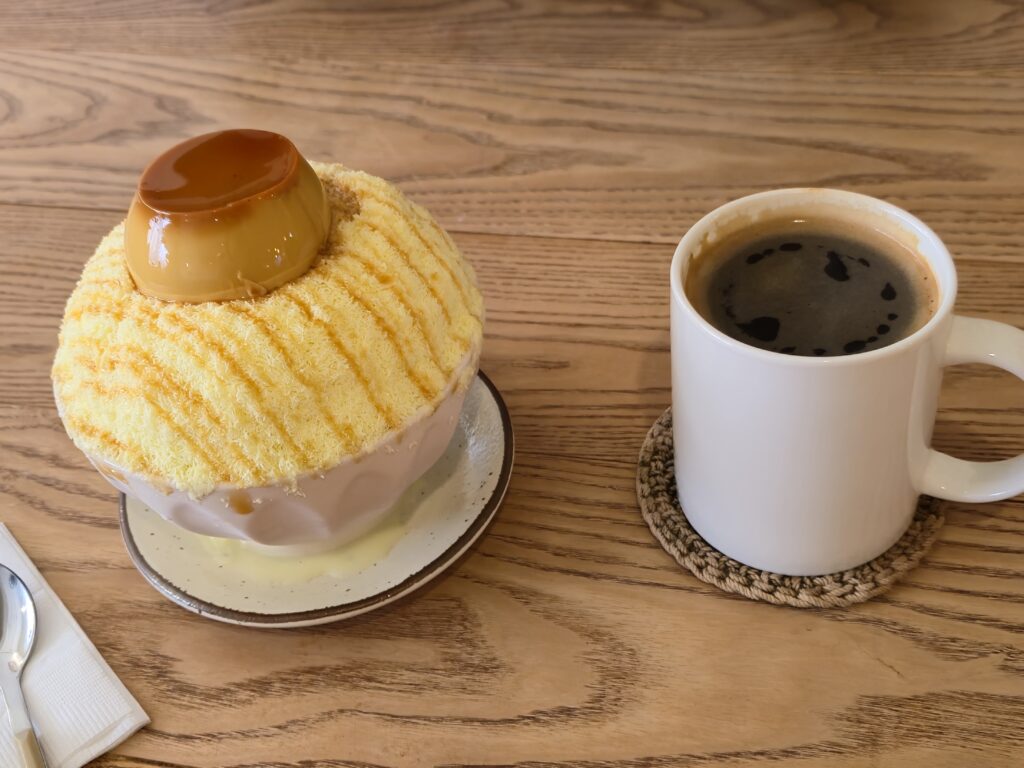 Custard cream pudding bingsu topped with a whole caramel pudding at Ruver Coffee, Jeonpo.
