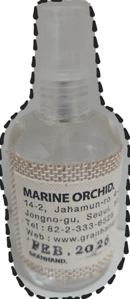 Granhand Marine Orchid Multi Perfume with a signature fabric label and custom stamping.